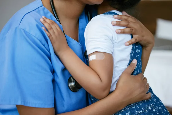Shot Nurse Hugging Little Girl Plaster Her Arm —  Fotos de Stock