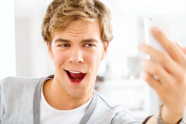 Shot Young Woman Making Funny Faces While Taking Selfies His — ストック写真