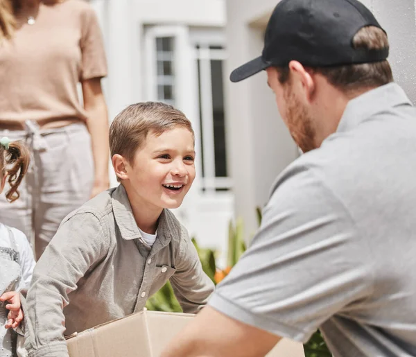 Cropped Shot Adorable Little Boy Collecting His Mothers Delivery Male — Foto Stock