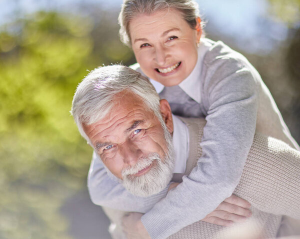 Shot of a senior couple bonding outdoors together.