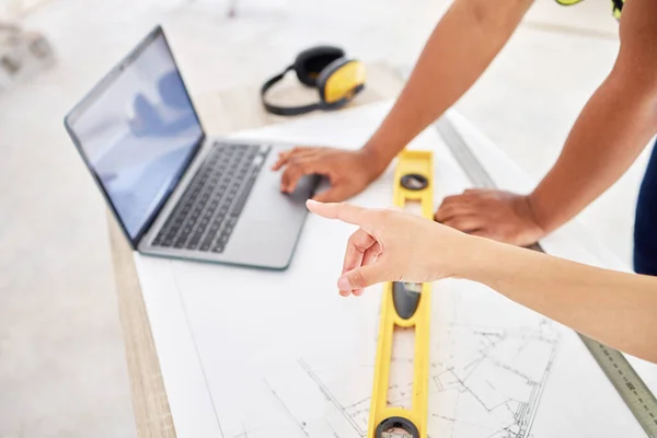 Cropped Shot Two Unrecognisable Contractors Standing Together Using Laptop While — Stockfoto