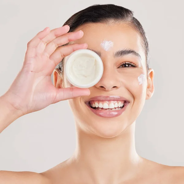Shot Young Woman Applying Cream Her Face Grey Background — Foto de Stock