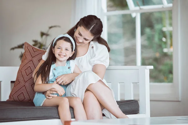 Shot Adorable Little Girl Relaxing Her Mother Sofa Home — Stock Photo, Image