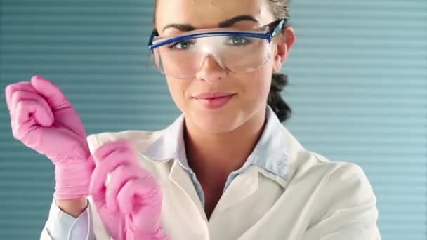 Video Footage Young Female Scientist Applying Her Gloves — Video