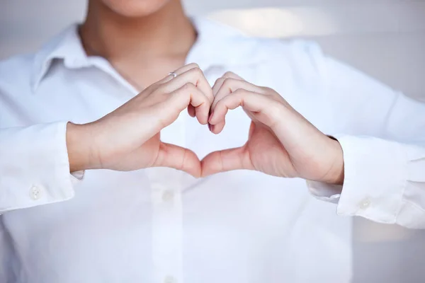 Cropped Shot Unrecognizable Businesswoman Forming Heart Shape Her Hands — Zdjęcie stockowe
