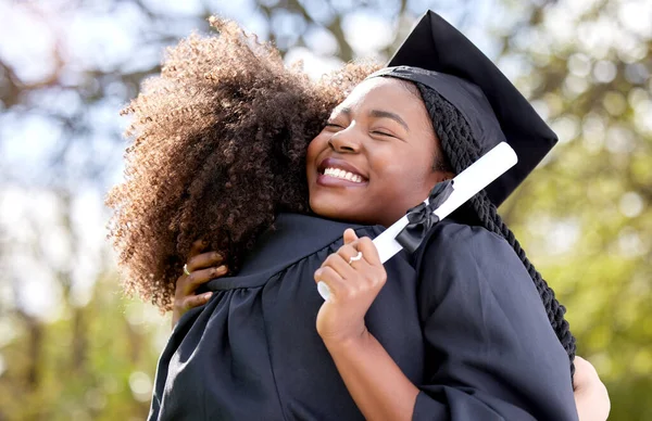 Shot Young Woman Hugging Her Friend Graduation Day — Stok fotoğraf
