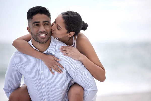 Cropped Shot Handsome Young Man Piggybacking His Girlfriend Beach — Stockfoto