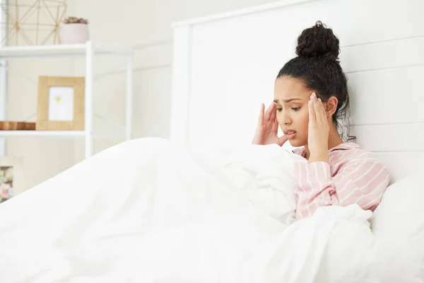 Shot Young Woman Looking Stressed While Sitting Bed — Stock Fotó