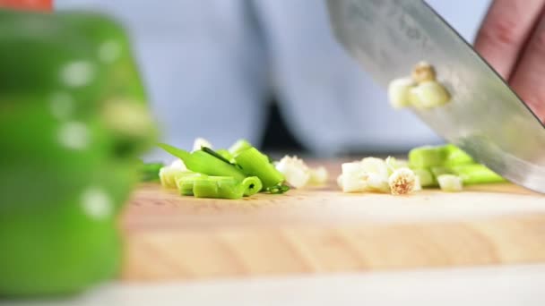 Video Footage Man Slicing Spring Onion While Preparing Meal — Stockvideo