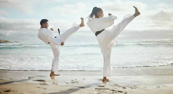 Full Length Shot Two Young Martial Artists Practicing Karate Beach — Zdjęcie stockowe