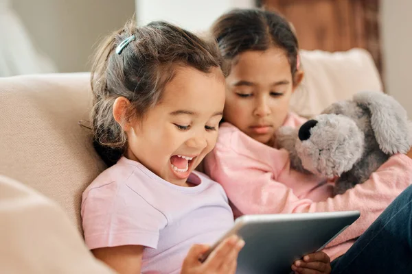 Shot Two Little Girls Sitting Together While Using Digital Tablet — Stock fotografie
