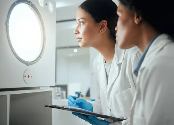 Shot Two Female Scientists Looking Door Waiting Results — Stockfoto