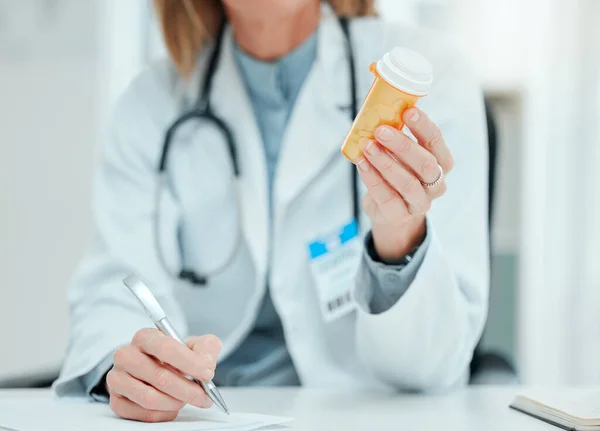 Cropped Shot Unrecognisable Doctor Sitting Alone Her Clinic Writing Notes — Foto Stock
