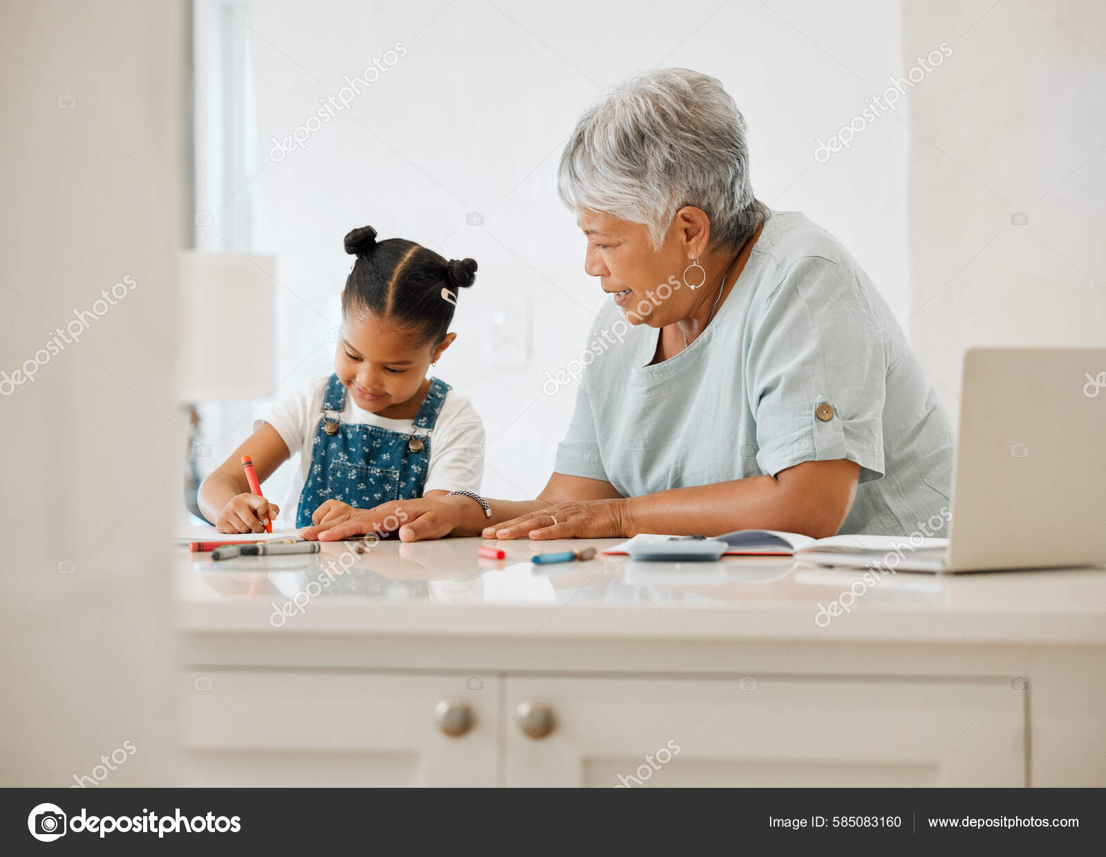 Shot Grandma Helping Her Granddaughter Kitchen Table Home Stock Photo by  ©PeopleImages.com 585083160