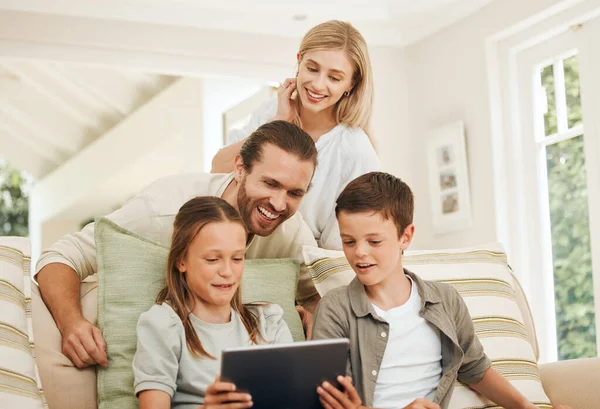 Shot Young Caucasian Family Spending Time Together Home While Using — Zdjęcie stockowe