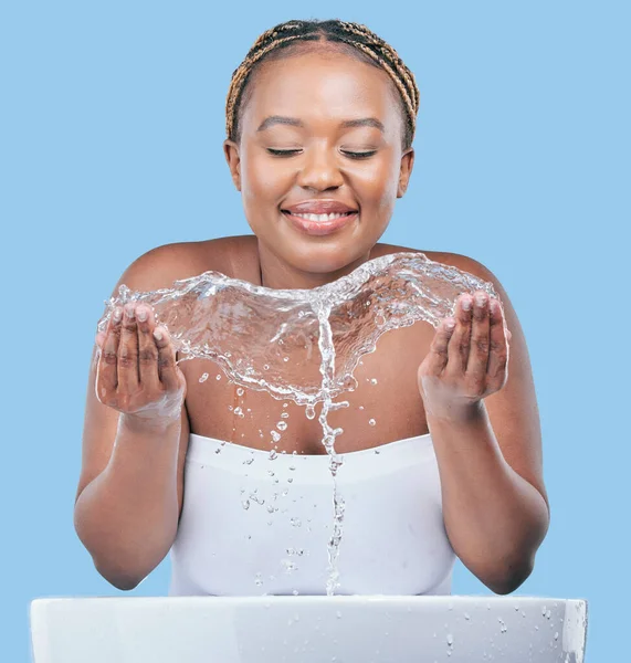 Studio Shot Attractive Young Woman Washing Her Face Blue Background — Fotografia de Stock