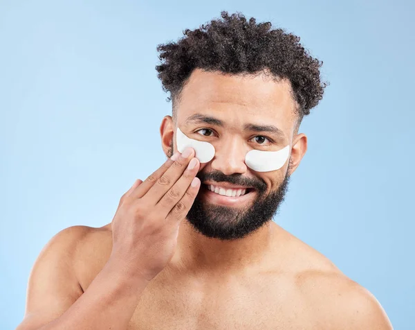 Studio Portrait Handsome Young Man Wearing Eye Patches Blue Background —  Fotos de Stock