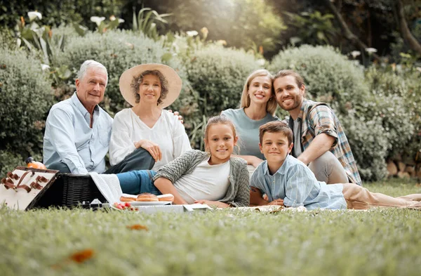 Shot of a multi-generational family spending time together outdoors.