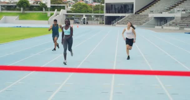 Black Woman Winning Race Celebrating While Crossing Finish Line Runner — Stock Video