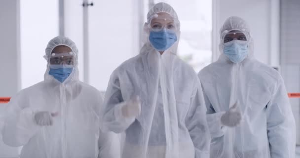 Closeup Team Microbiologists Approving Completion Sanitizing Area Group Scientists Hazmat — Stockvideo