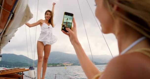 Carefree Happy Young Woman Posing Yacht Friend Taking Her Photo — 图库视频影像
