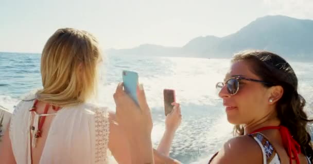Video Footage Two Attractive Young Women Taking Selfies Boat Holiday — Stockvideo