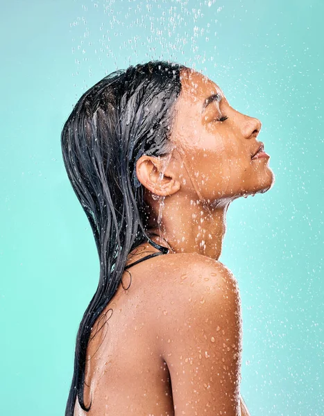 Attractive Young Woman Showering Blue Background — Foto de Stock