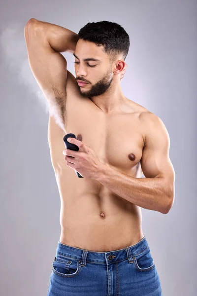 Studio Shot Handsome Young Man Spraying Deodorant His Armpit — 图库照片