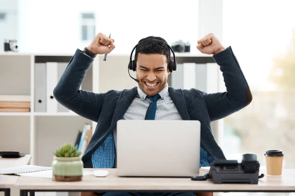 Young Male Call Center Agent Cheering While Using Laptop Office — Foto de Stock