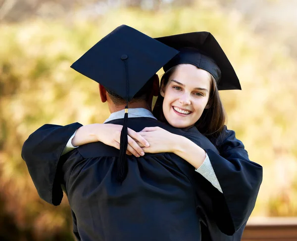 Portrait Young Woman Hugging Her Friend Graduation Day — Foto Stock