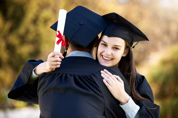 Portrait Young Woman Hugging Her Friend Graduation Day — Foto Stock