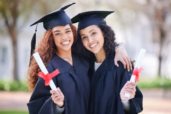 Portrait Two Young Women Holding Diplomas Graduation Day — Stok fotoğraf