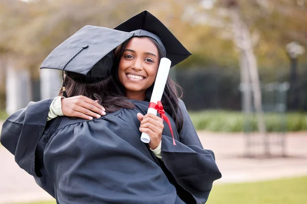Portrait Young Woman Hugging Her Friend Graduation Day — Stok fotoğraf
