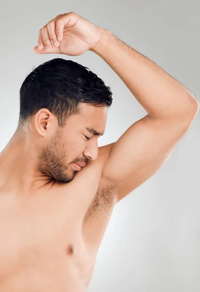 Studio Shot Handsome Young Man Looking Disgusted His Smelly Armpits — Fotografia de Stock