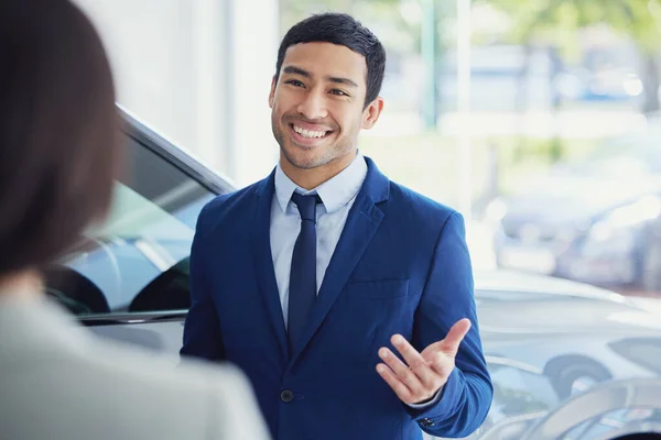 Handsome Young Male Car Salesman Talking Female Customer Showroom Floor — Stockfoto