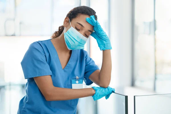 Female Nurse Looking Stressed While Standing Hospital — 图库照片