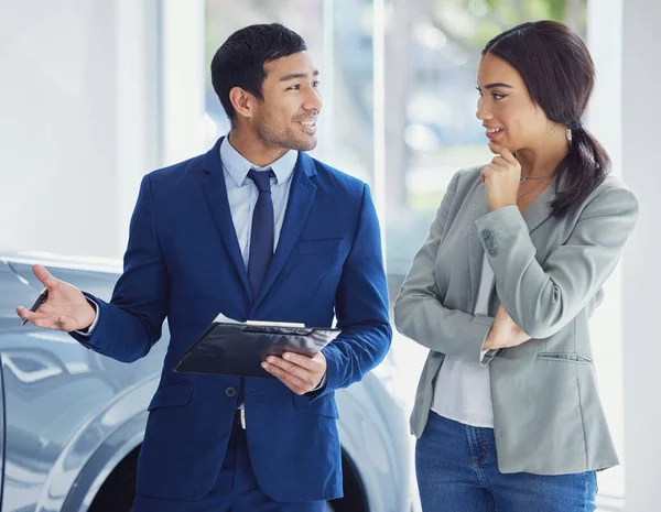 Handsome Young Male Car Salesman Talking Female Customer Showroom Floor — Stockfoto