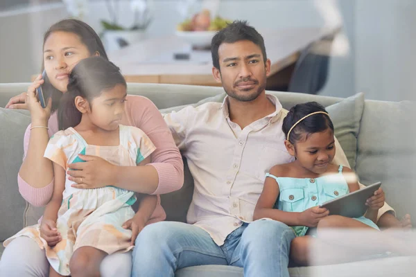 Young Family Relaxing Together While Using Digital Tablet — Stock Fotó