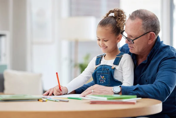 Grandfather Helping His Grandchild Her Homework Home — Stok fotoğraf