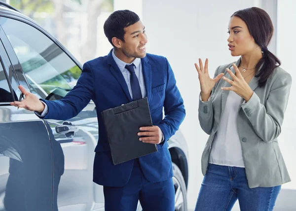 Handsome Young Male Car Salesman Talking Female Customer Showroom Floor — Stockfoto