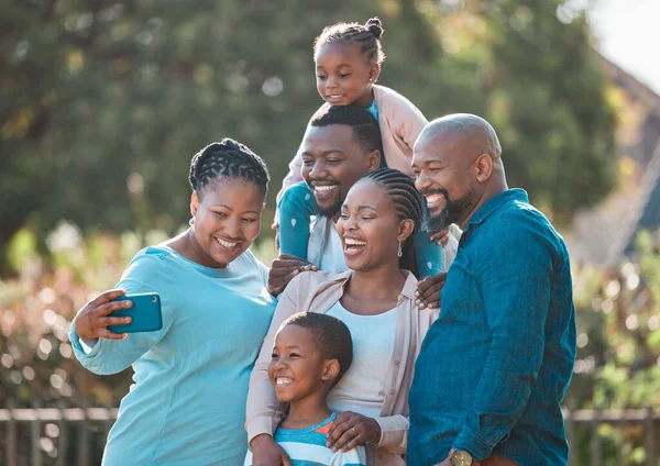 Multi Generational Family Taking Selfie Together — Stockfoto