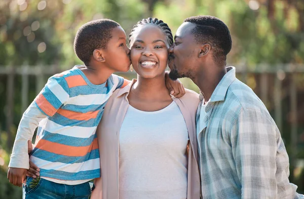 Woman Getting Kisses Her Cheek Her Husband Son — Stok Foto