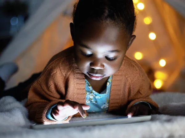 Adorable Little Girl Using Digital Tablet Bedtime Home — Stockfoto