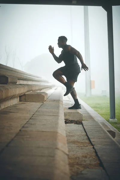 Muscular Young Man Running Steps Outdoors — Stok fotoğraf