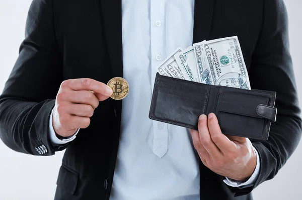 Closeup Shot Unrecognisable Businessman Holding Bitcoin Wallet Filled Banknotes White — Stock Photo, Image