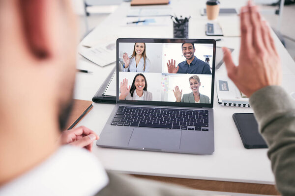 a business waving during a video call.