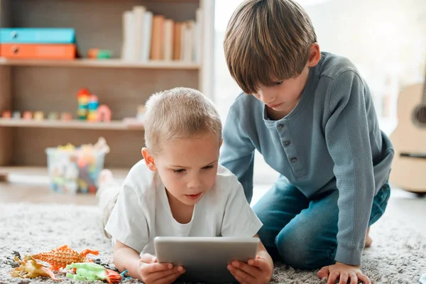 Two Brothers Using Tablet Home — Stock Fotó