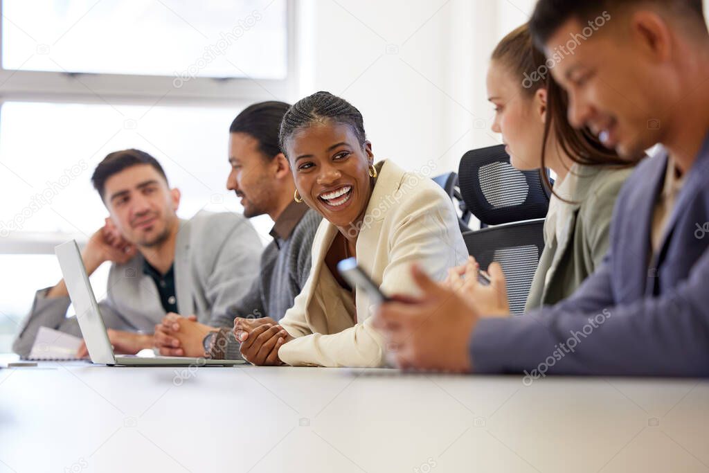 a group of businesspeople having a meeting in a boardroom at work.