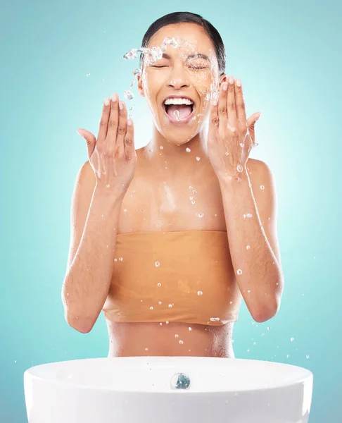 Young Woman Doing Her Daily Skincare Routine Blue Background — 图库照片