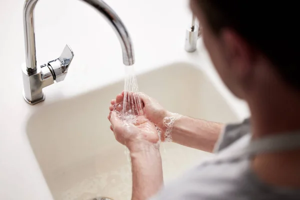 Unrecognizable Person Washing Hands Kitchen Sink Home — Stok fotoğraf